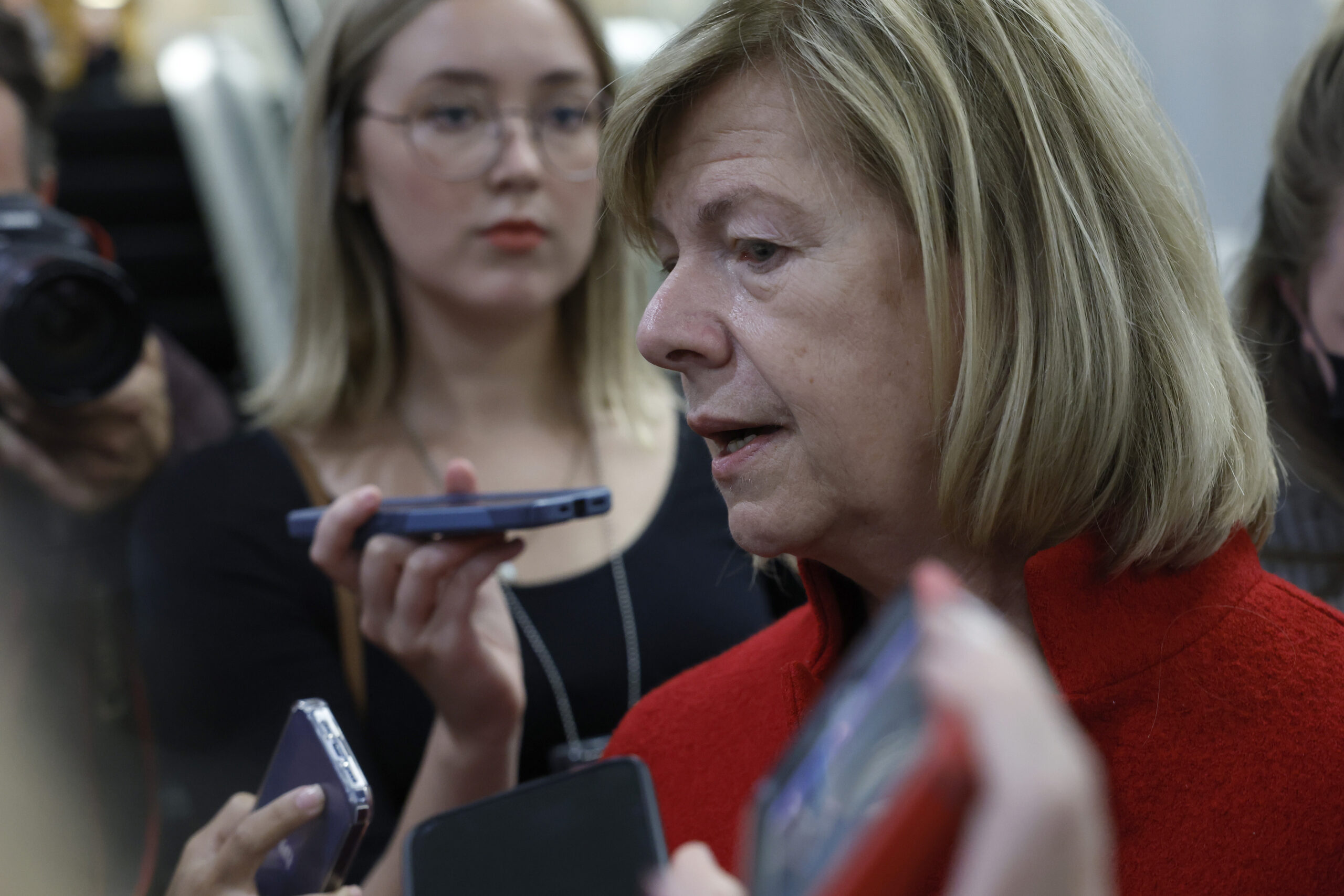 Photograph of Senator Tammy Baldwin speaking to reporters