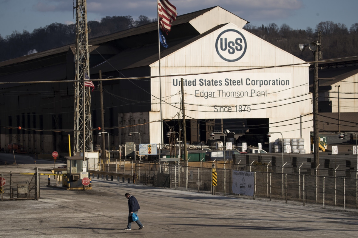 Photograph of a worker leaving U.S. Steel Edgar Thomson Steel Works