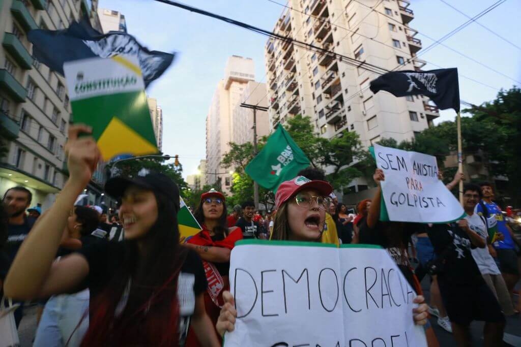 Image of protesters aiming to defend democracy following when former Brazilian President Jair Bolsonaro's supporters stormed government buildings in Brasilia