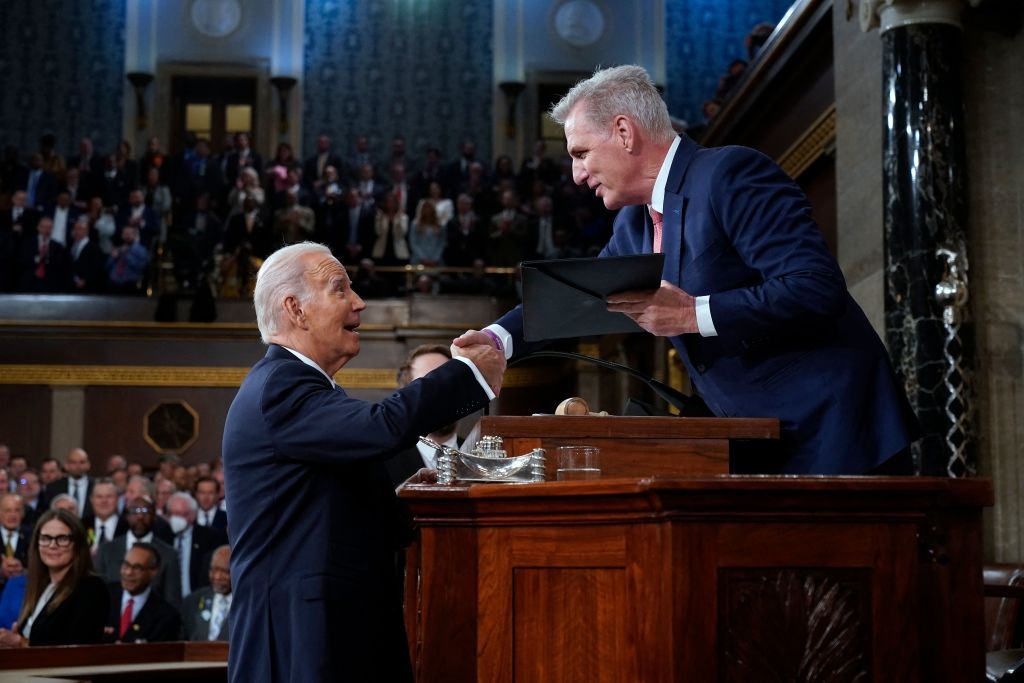Image of President Joe Biden shaking House Speaker Kevin McCarthy’s (R-Calif.) hand