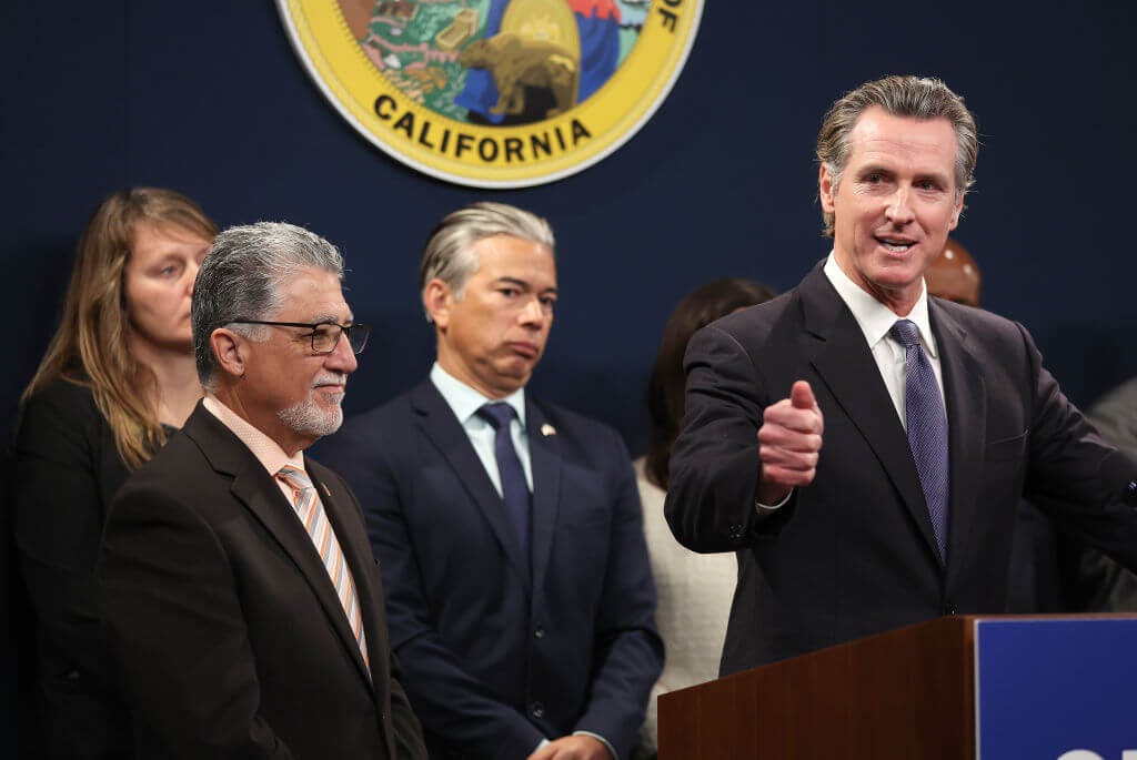 Image of California Gov. Gavin Newsom speaking at a press conference.