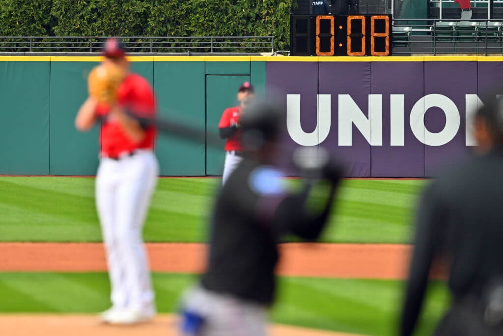 Image of the new MLB pitch clock behind Cleveland Guardians pitcher Shane Bieber.