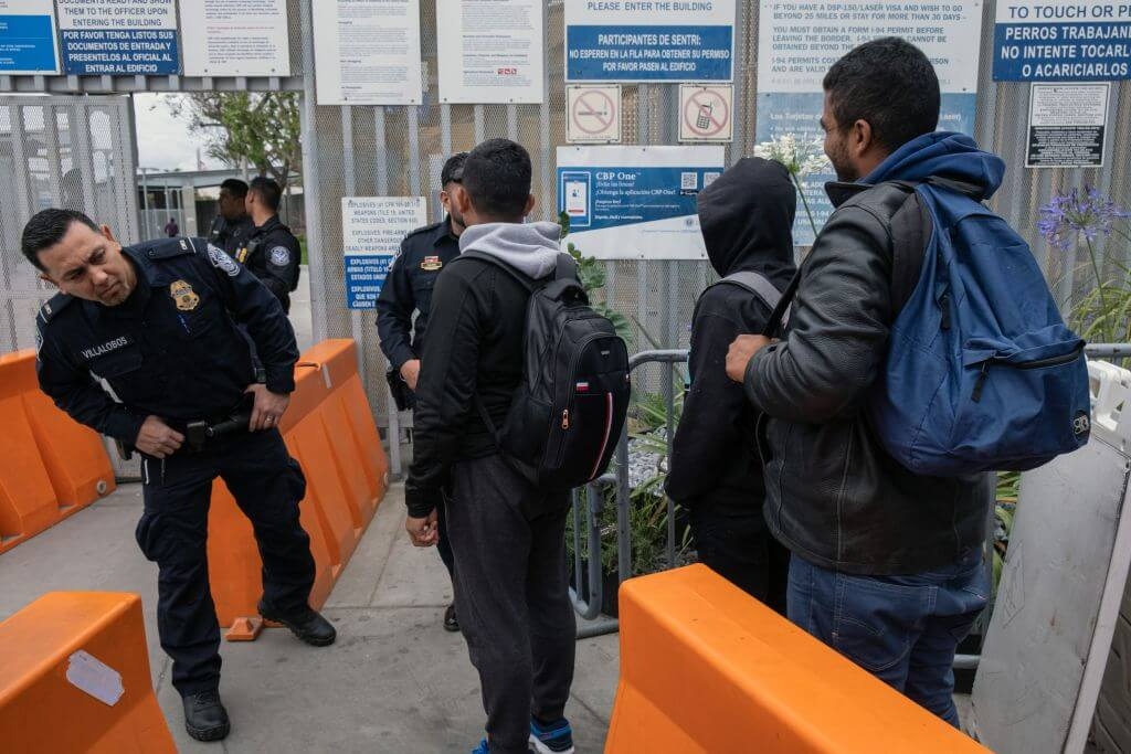 Image of asylum seekers from Venezuela entering the United States.